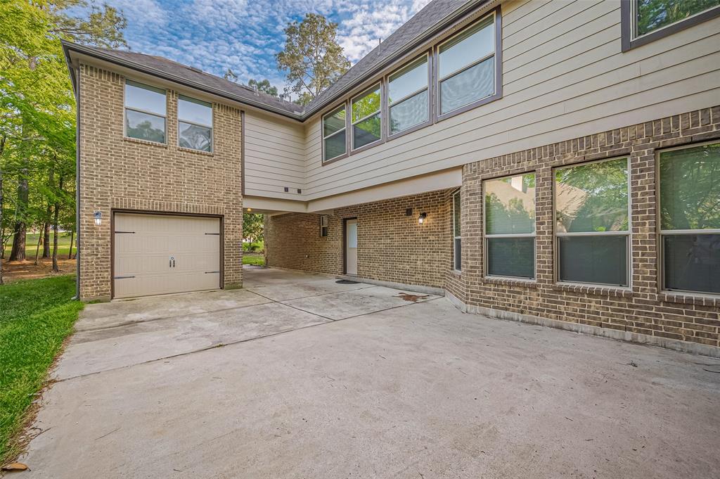 11306 Longmire Creek Court, Conroe, Texas image 36