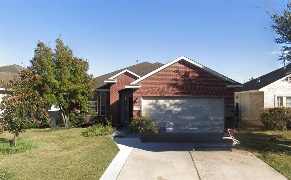 7534 Oakwood Canyon Drive, Cypress, Texas image 1