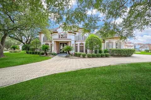 Photo of 13719 Neils Branch Drive, Houston, TX 77077 (MLS # 49661226)