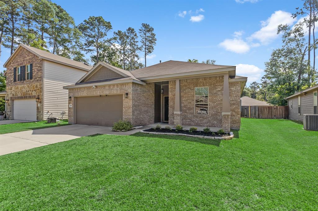 4275 Roaring Timbers Drive, Conroe, Texas image 1