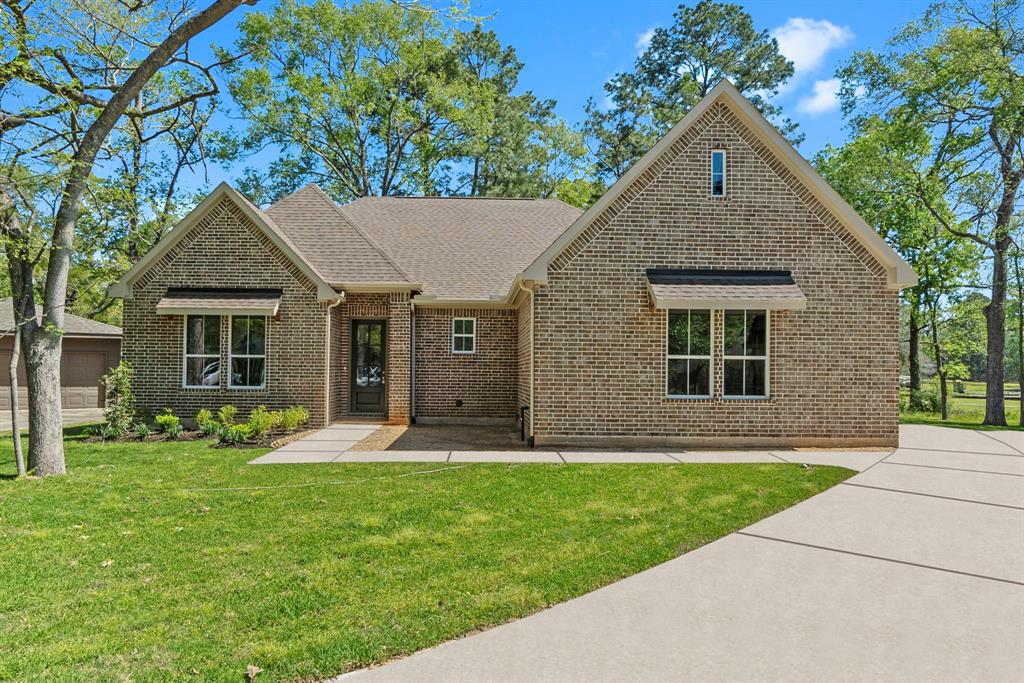557 Hermitage Court, Conroe, Texas image 1