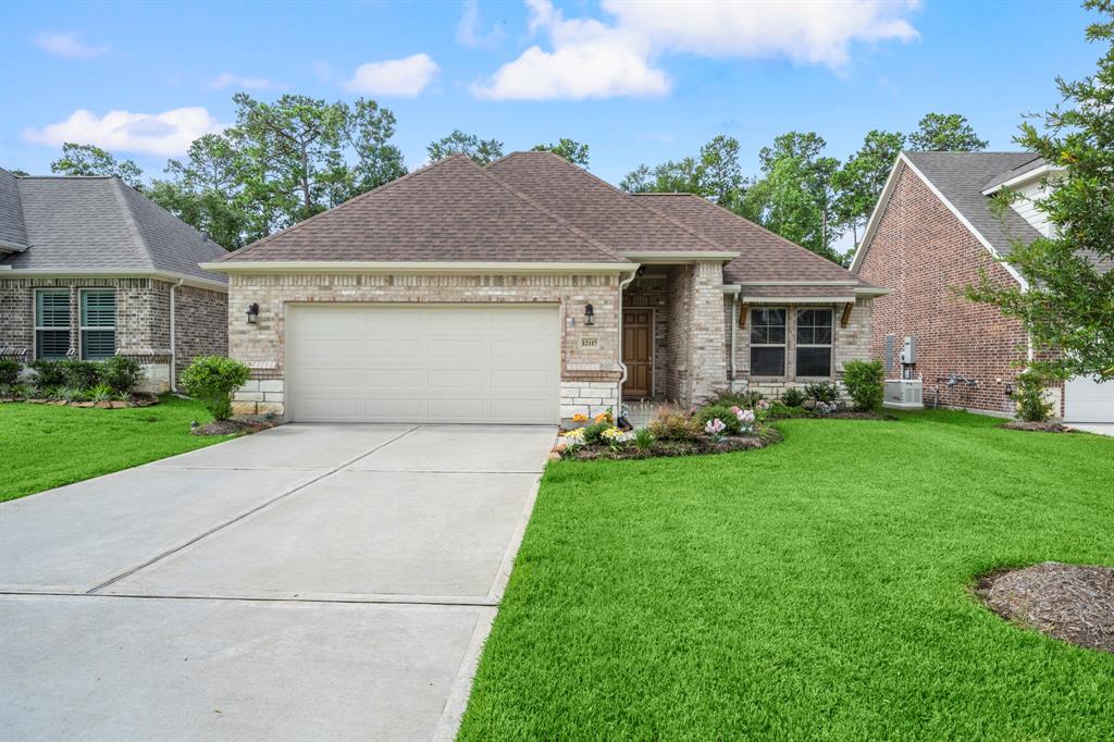 12117 Creekside Villas Court, Conroe, Texas image 1