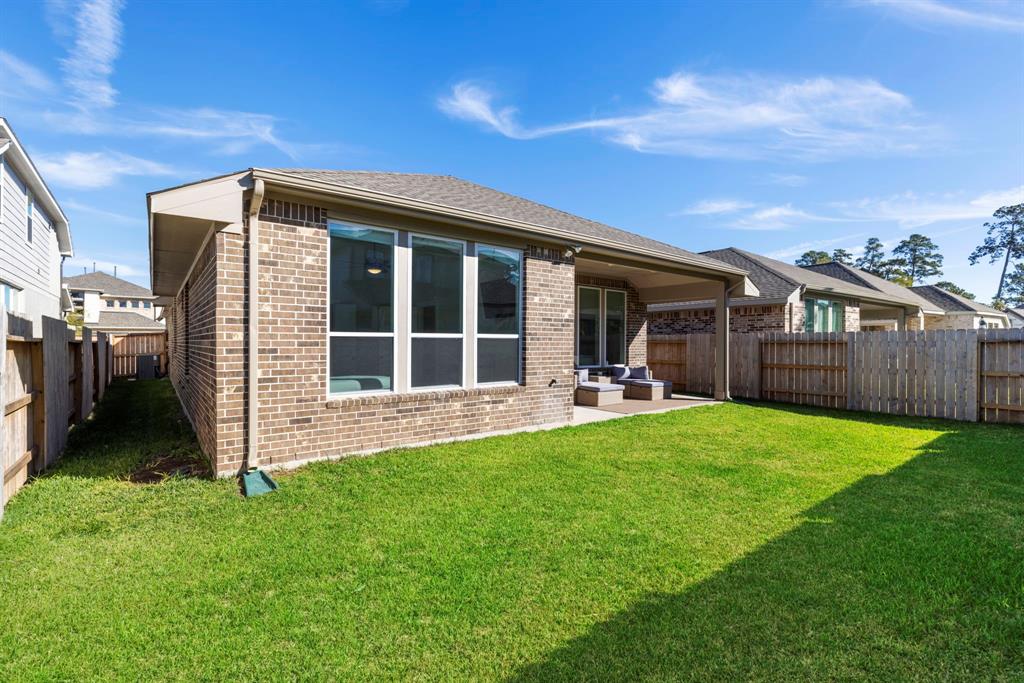 444 Texoma Plains Drive, Conroe, Texas image 24