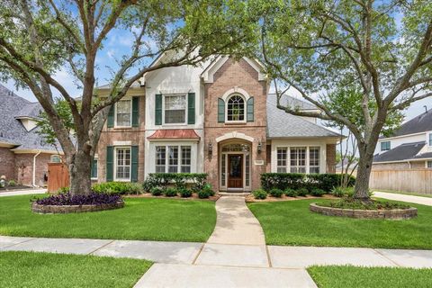 Photo of 12326 Lakeshore Ridge Rdg, Houston, TX 77041 (MLS # 68916230)