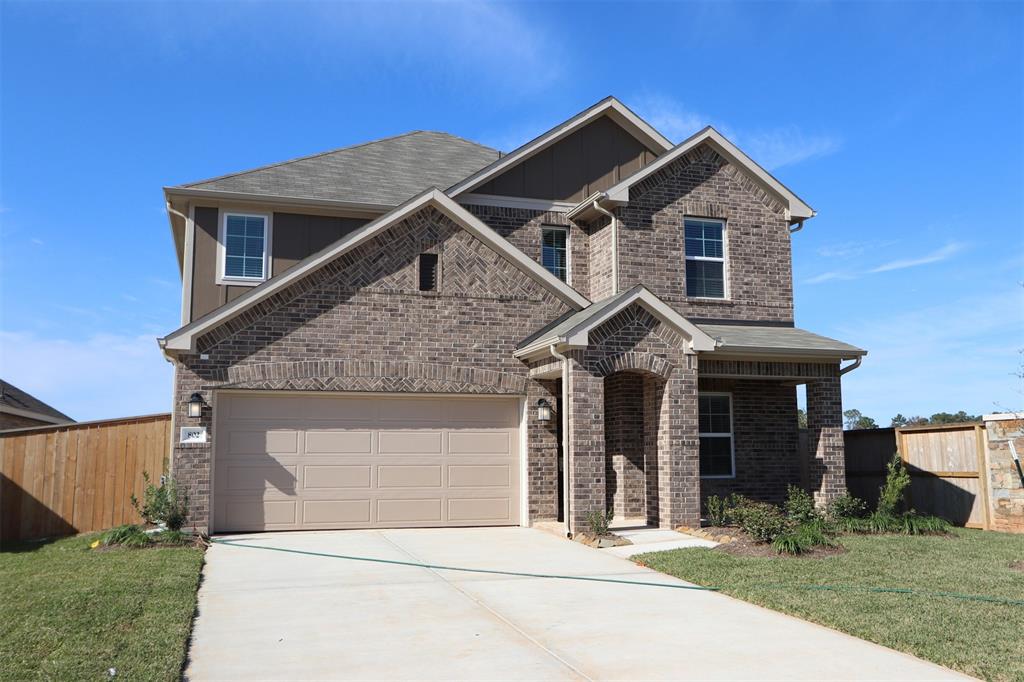 802 Falling Cave Drive, Willis, Texas image 1