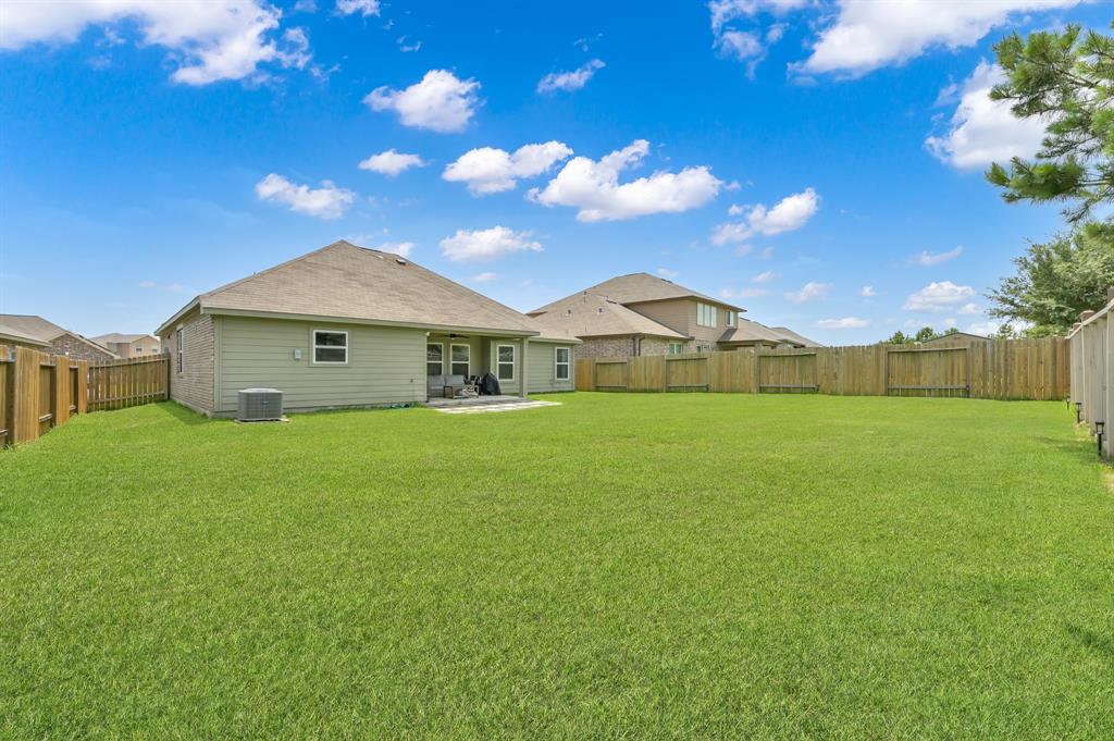 22510 Red Sparrow Drive, Hockley, Texas image 38