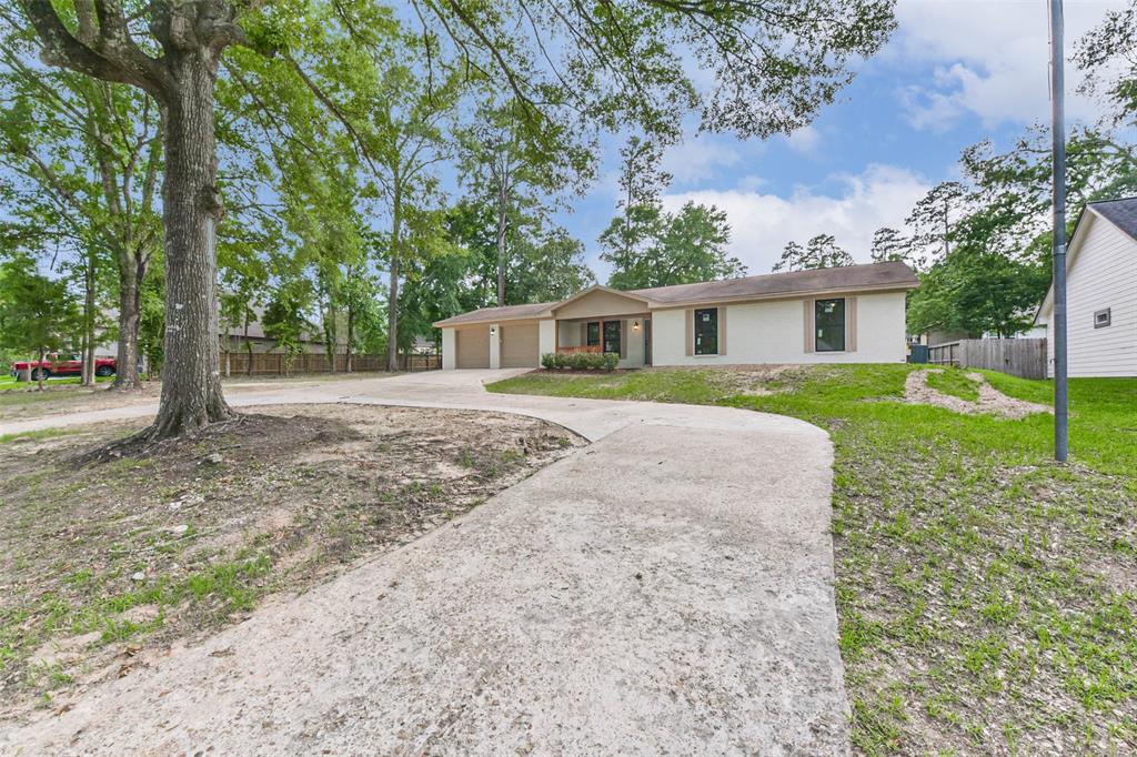 9096 N Comanche Circle, Willis, Texas image 28