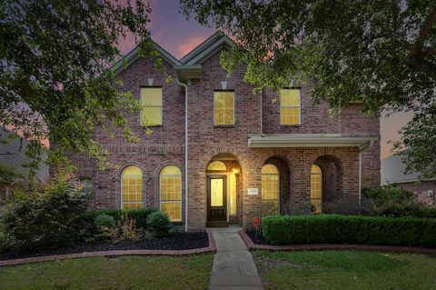 Single Family Residence in Katy TX 23911 Sunset Sky.jpg