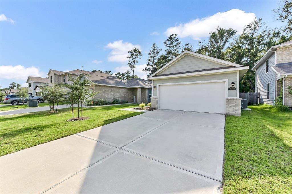 Photo of 21030 Voyage Lane, Porter, TX 77365 (MLS # 65249134)