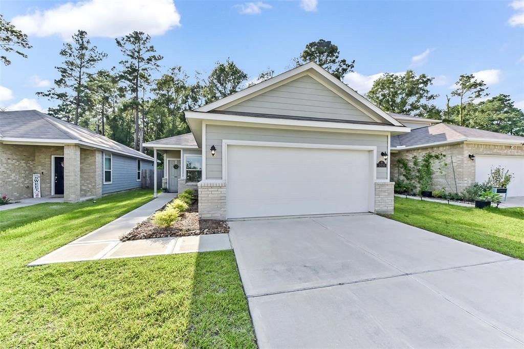Photo of 21030 Voyage Lane, Porter, TX 77365 (MLS # 65249134)