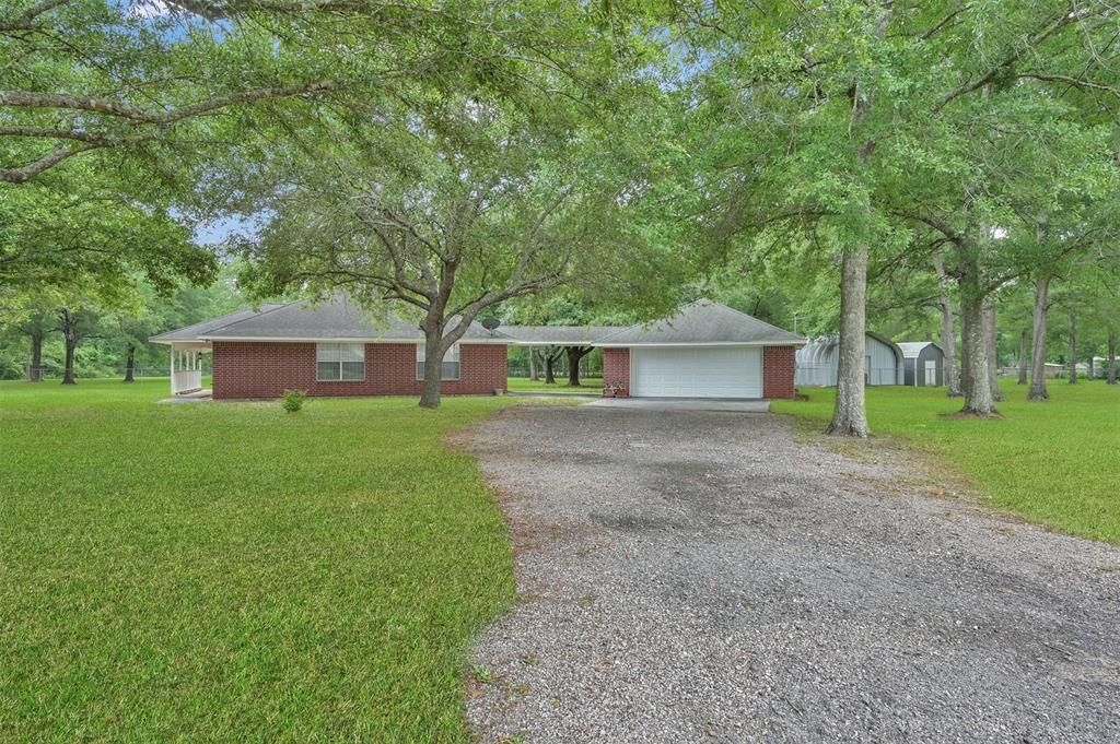 Photo of 19710 Lowe Street, Porter, TX 77365 (MLS # 49126250)