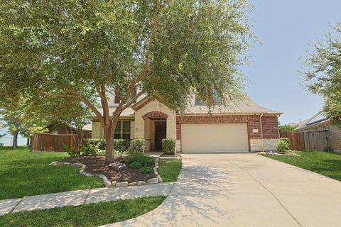 Photo of 10546 Hartfield Bluff Lane, Cypress, TX 77433 (MLS # 30210497)