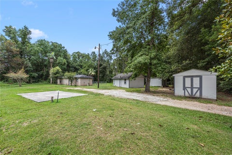 Photo of 394 County Road 3378, Cleveland, TX 77327 (MLS # 7142059)