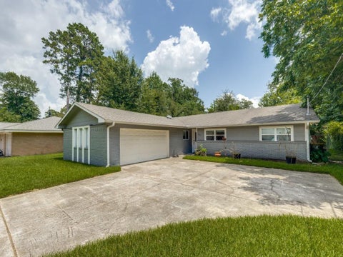 Photo of 407 Lilly Boulevard, Conroe, TX 77301 (MLS # 19690447)