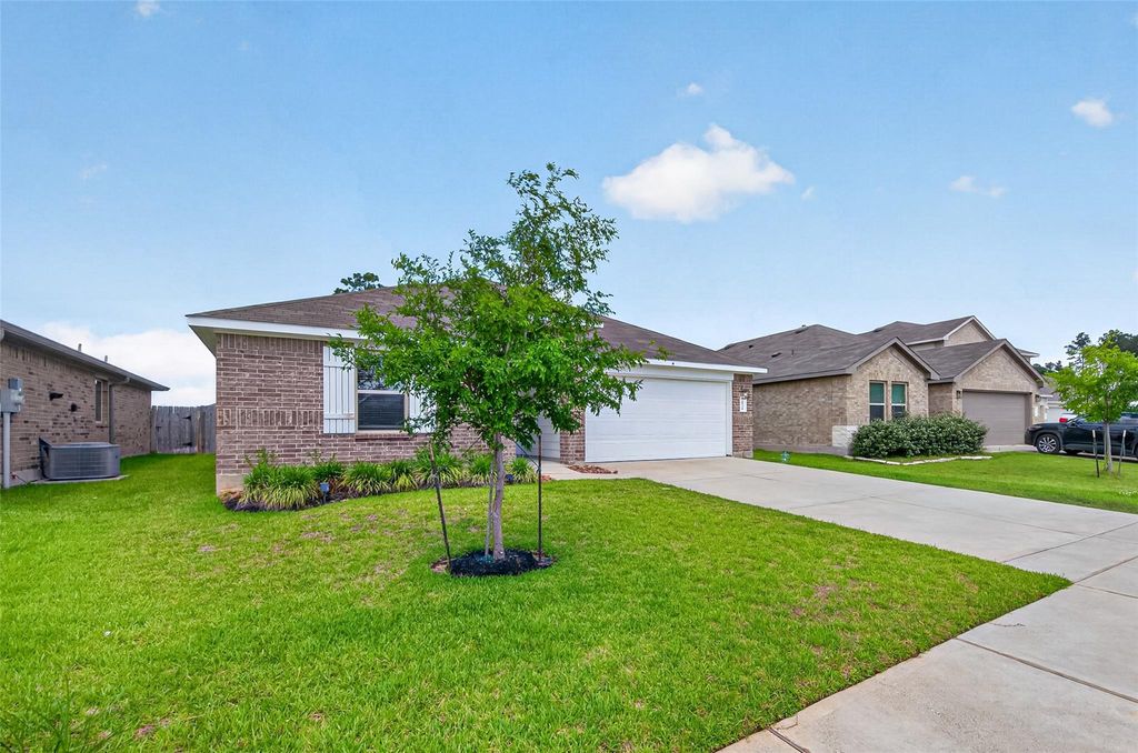 Photo of 20314 Tembec Drive, New Caney, TX 77357 (MLS # 62048802)