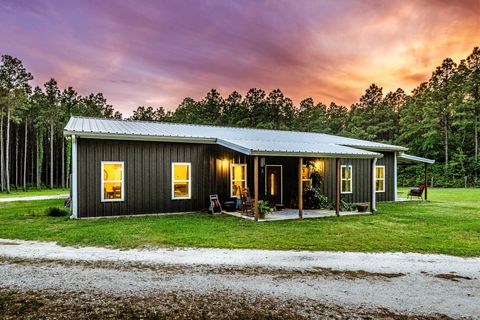 Photo of 1515 Fm 247, Huntsville, TX 77320 (MLS # 80856256)