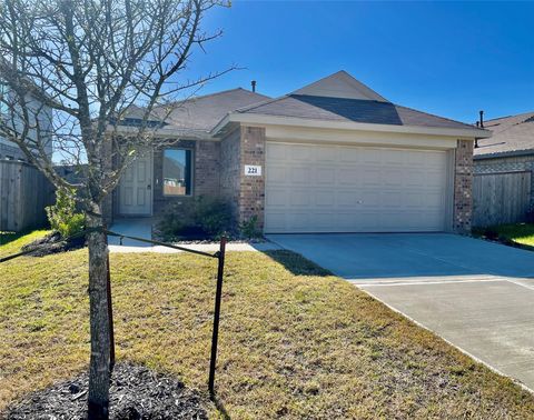 Photo of 221 Crystal Bay Ln Ln, Willis, TX 77378 (MLS # 82006042)