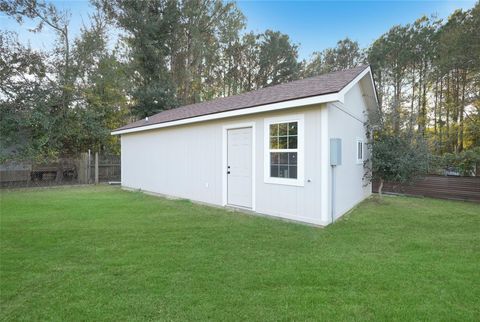 Photo of 314 County Road 3570, Cleveland, TX 77327 (MLS # 9016596)