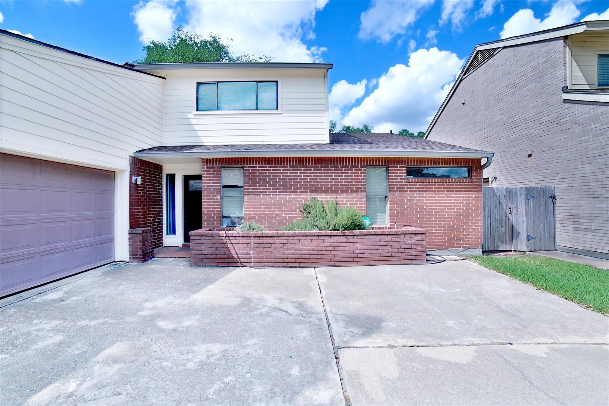 10318 Piping Rock Lane
