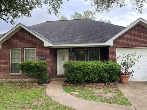 Photo of 8012 Folkstone Lane, Houston, TX 77075 (MLS # 82060636)