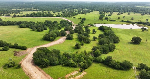Photo of 16 Baker Ridge Rd, Midway, TX 75852 (MLS # 41050773)