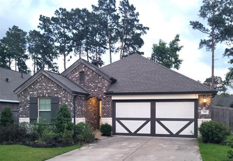 Photo of 338 Honey Mesquite Path, Willis, TX 77318 (MLS # 43529408)