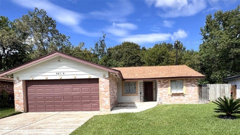 Photo of 12631 Fern Forest Drive, Houston, TX 77044 (MLS # 38449072)