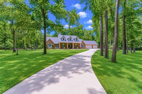 Photo of 16812 Mustang Trail Drive, Magnolia, TX 77355 (MLS # 2928437)
