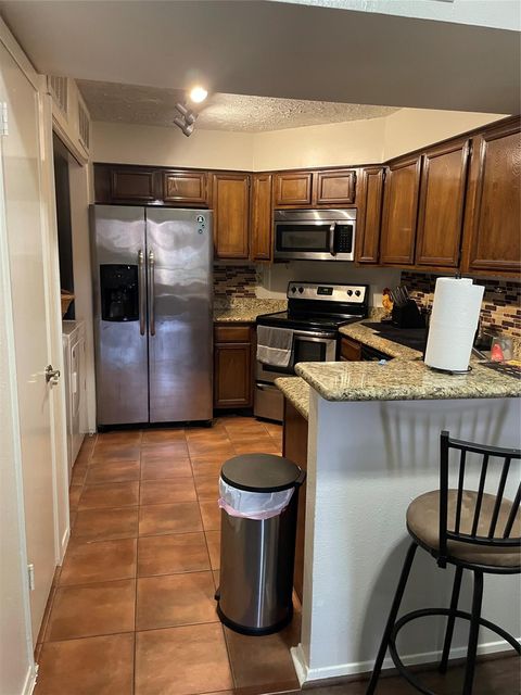 Tiny photo for 10555 Turtlewood Court #3005, Houston, TX 77072 (MLS # 98601905)