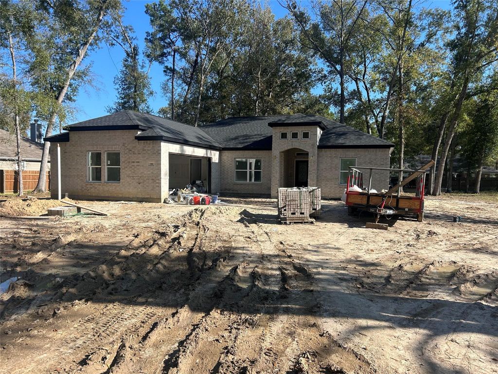 Photo of 390 N Linnwood Dr, Woodbranch, TX 77357 (MLS # 75888051)