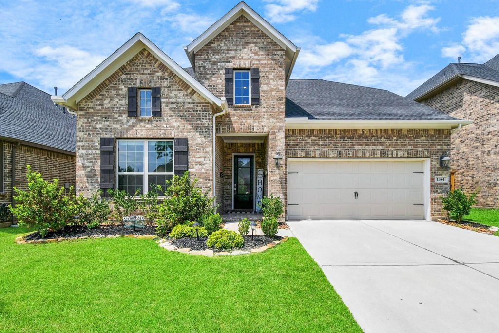 Photo of 1354 Knollbridge Point Lane, Pinehurst, TX 77362 (MLS # 14596626)