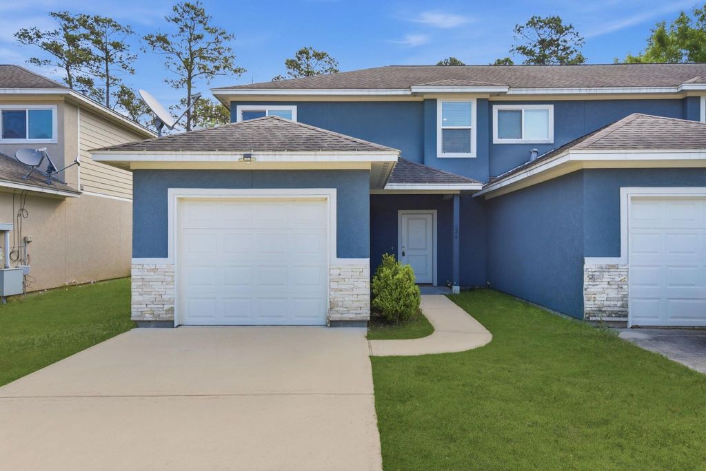 Photo of 618 Magnolia Bend Bnd, New Caney, TX 77357 (MLS # 48368621)