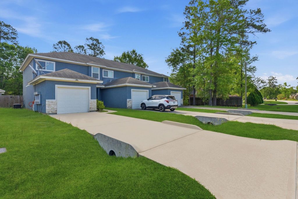 Photo of 618 Magnolia Bend Bnd, New Caney, TX 77357 (MLS # 48368621)