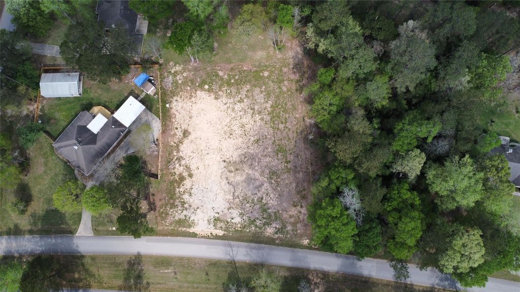 Photo of 2607 Roman Forest Boulevard, New Caney, TX 77357 (MLS # 36308652)