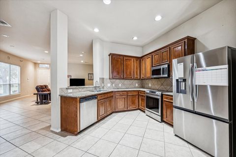 Photo of 14906 Tuttle Point Drive, Houston, TX 77082 (MLS # 30987249)