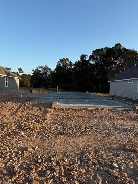 Photo of 606 Rockbridge Drive, Huntsville, TX 77340 (MLS # 56068051)