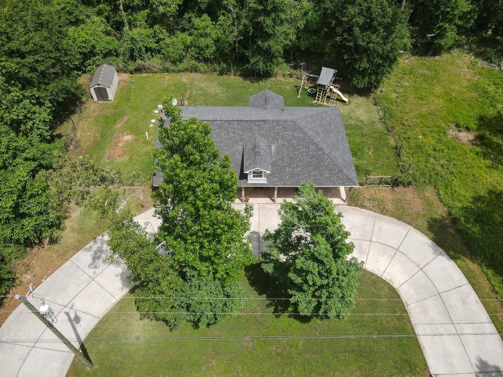 Photo of 3381 Roy Bean Rd Rd, Willis, TX 77378 (MLS # 80297767)