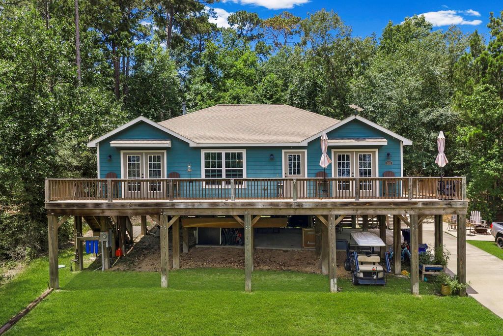 Photo of 241 Whisperwood Drive, Onalaska, TX 77360 (MLS # 77618121)