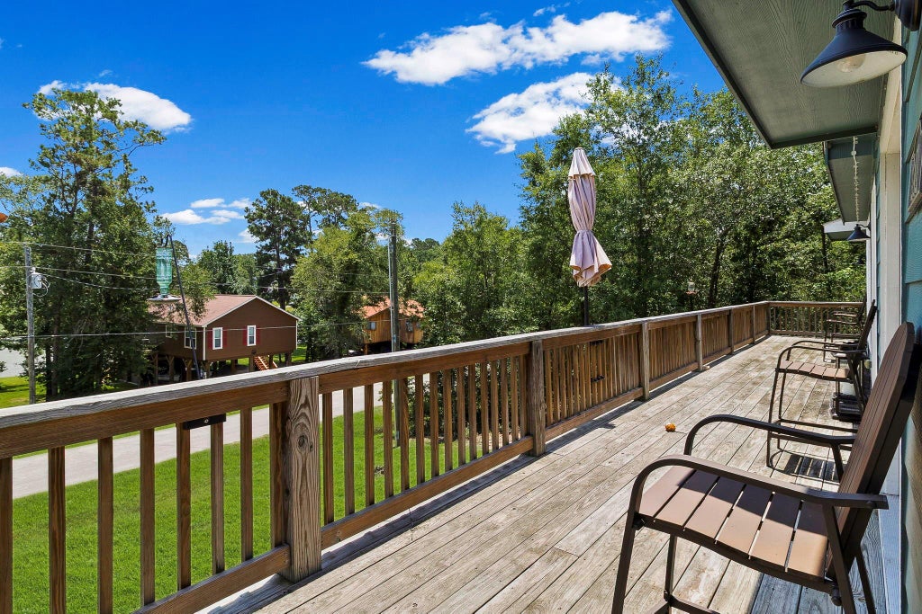Photo of 241 Whisperwood Drive, Onalaska, TX 77360 (MLS # 77618121)