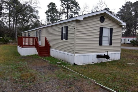 Photo of 2 Lake View Lane, Huntsville, TX 77340 (MLS # 74115404)