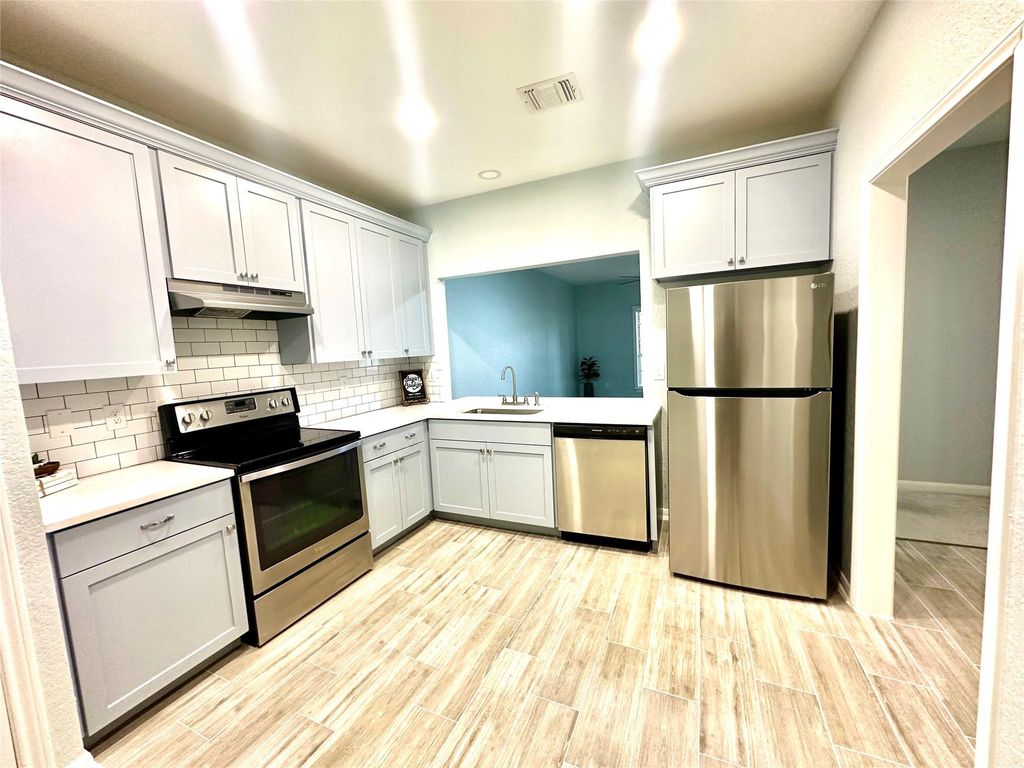 Photo of 2803 Kings Crossing Drive #205, Kingwood, TX 77345 (MLS # 70212273)