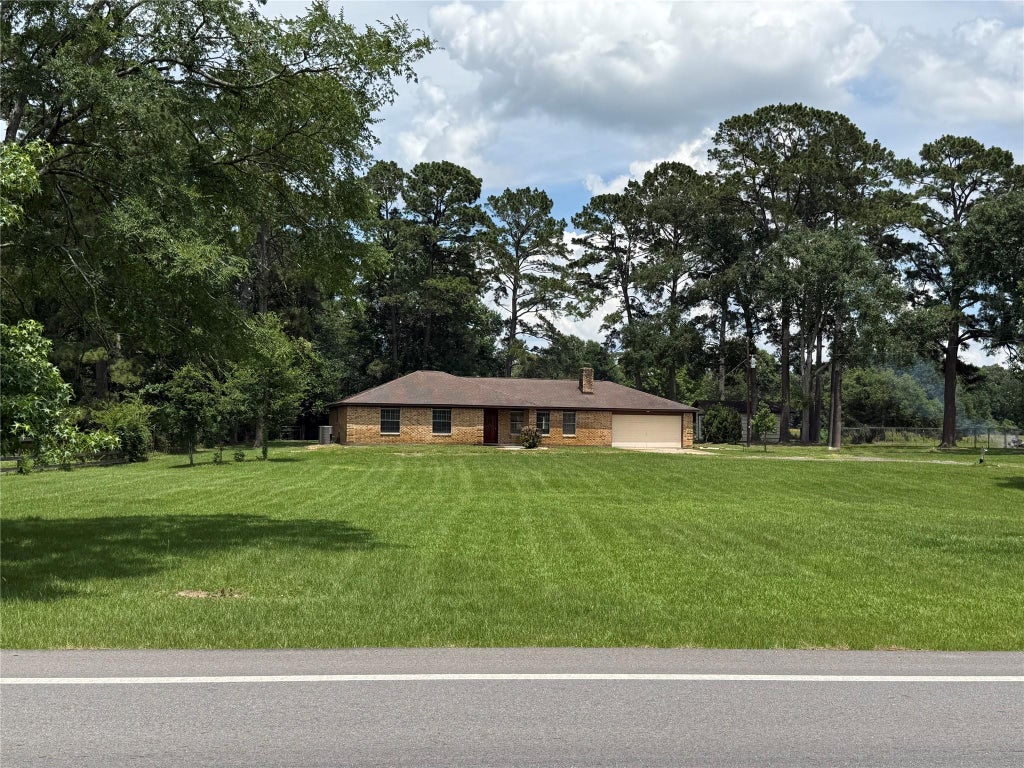 Photo of 18751 Fm 1484 Rd RD, Conroe, TX 77303 (MLS # 28662143)