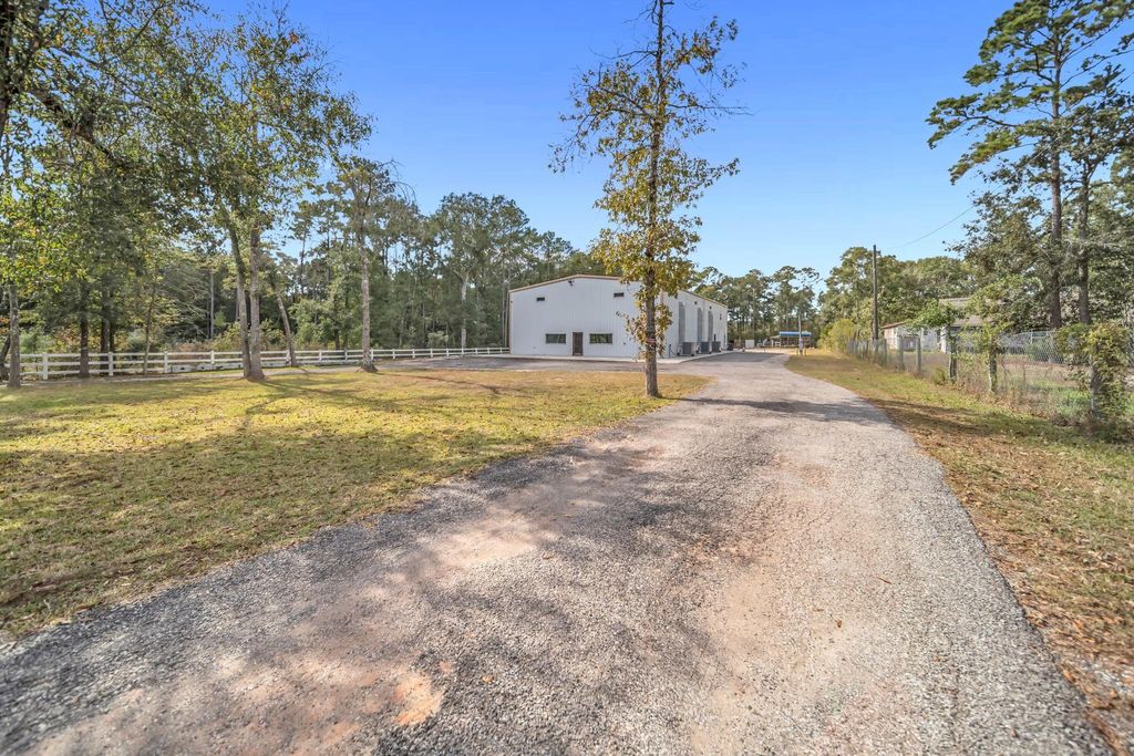 Photo of 10894 Los Cabos Drive, Conroe, TX 77306 (MLS # 98783814)