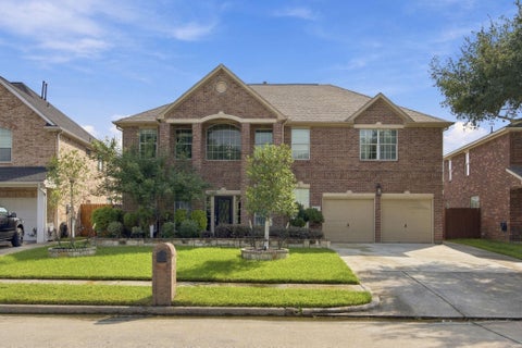 Photo of 6714 Russelfield Lane, Houston, TX 77049 (MLS # 40324795)