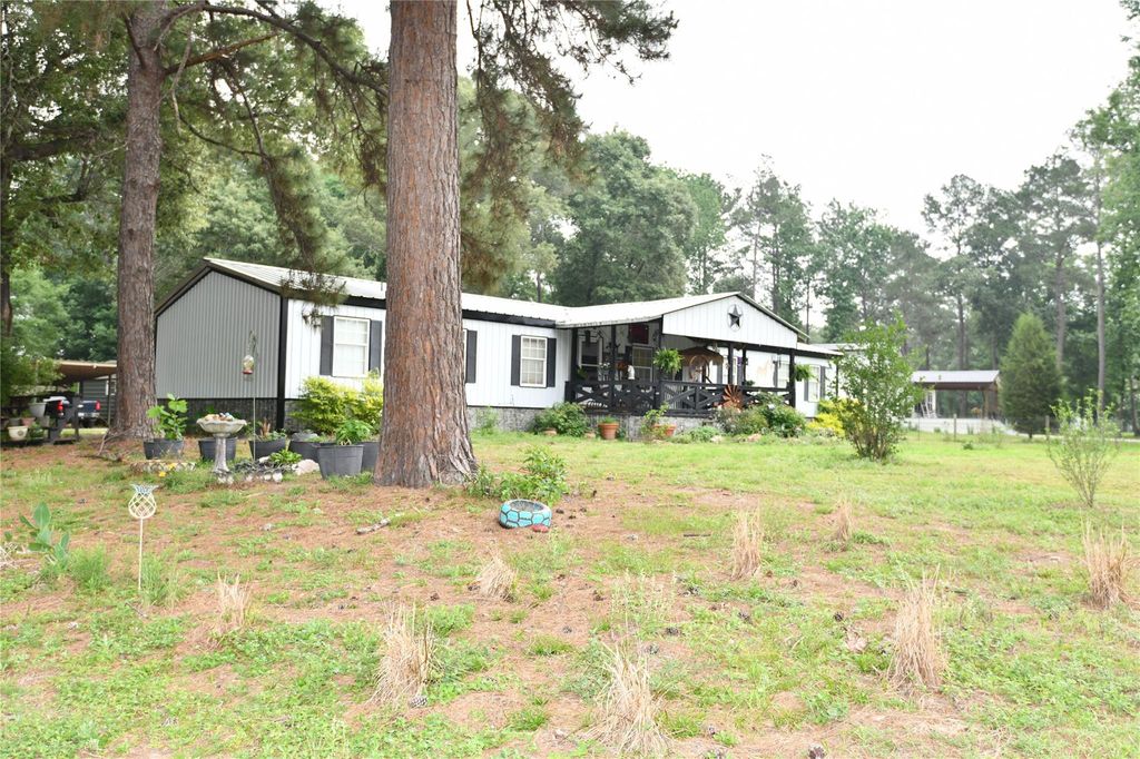 Photo of 101 Pinewood Drive, Shepherd, TX 77371 (MLS # 20184540)