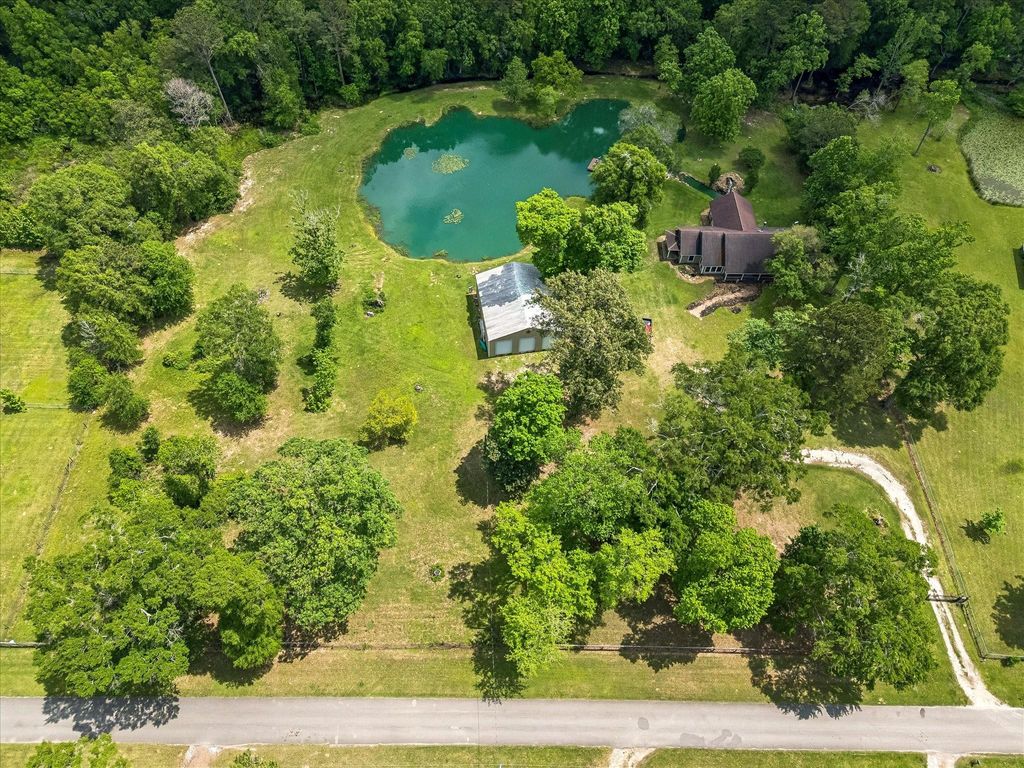 Photo of 736 County Road 3372, Cleveland, TX 77327 (MLS # 82391558)