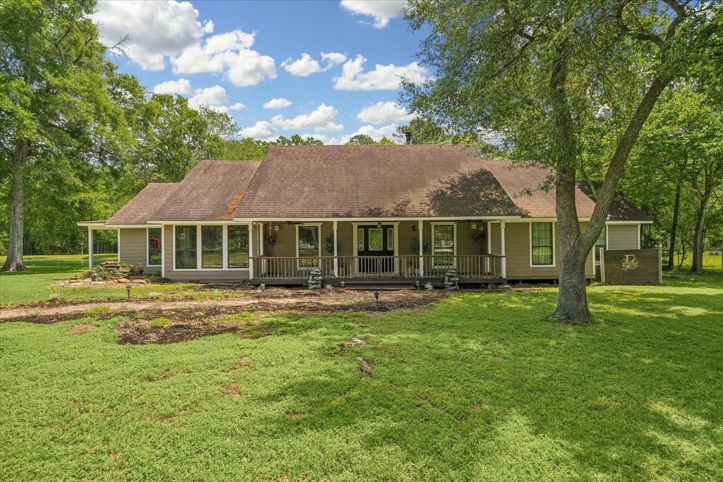 Photo of 736 County Road 3372, Cleveland, TX 77327 (MLS # 82391558)