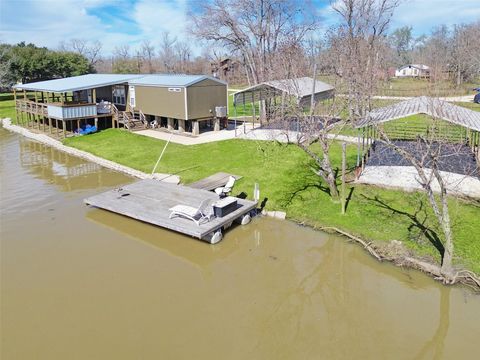 Photo of 398 River Oaks Drive, Trinity, TX 75862 (MLS # 88433010)