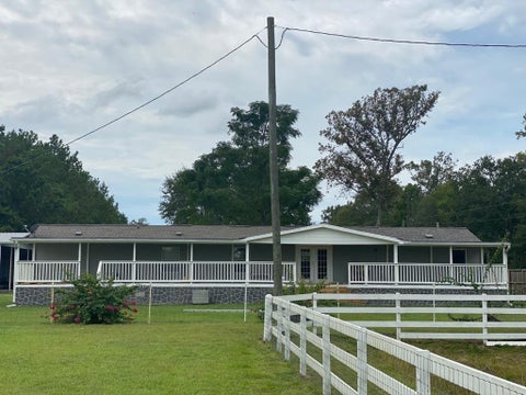 Photo of 12 County Road 5037, Cleveland, TX 77327 (MLS # 33490027)