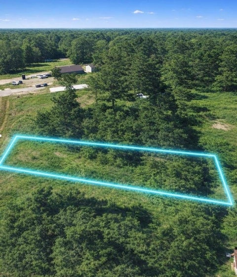 Photo of 122 Road 5604, Cleveland, TX 77327 (MLS # 64239052)